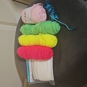 Neon, pink, blue yarn and white string
